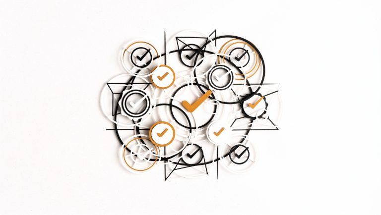Abstract black, white and amber geometric seal shapes representing verified B2B social proof